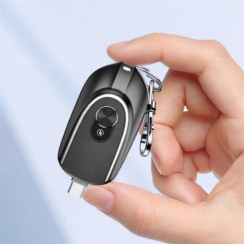 "2-in-1 Mini Keychain Power Bank with Retractable Plug, Waterproof Design, 1200mAh Backup, and Dual 5V Output – Convenient Keyring Charging Accessory"